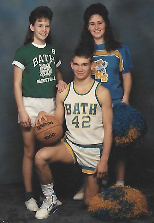 Ryan Young with his younger sisters